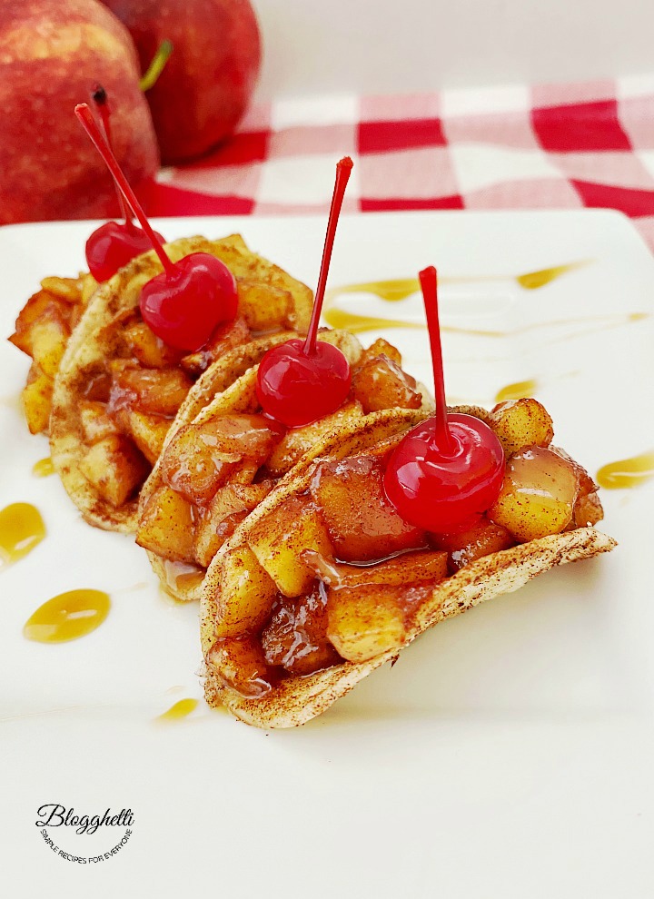 apple pie tacos with maraschino cherries on top